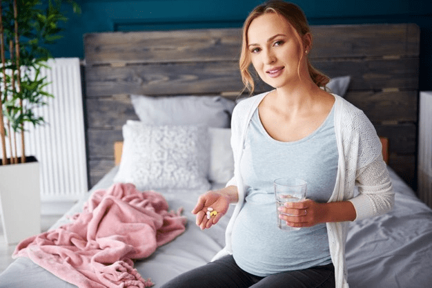 https://www.freepik.com/free-photo/portrait-young-pregnant-woman-taking-medicine-drinking-water_15972750.htm#page=1&query=vitamin%20d&position=31&from_view=search