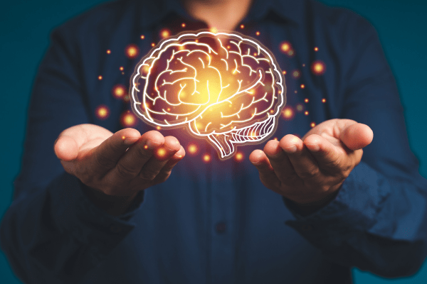 Няколко генетични фактора определят риска от развитие на 14 психични нарушения, сред които депресия и тревожност мъж с черна риза и изображение на човешки мозък