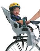 Предпазвайте детето си с колан и каска, когато го возите на велосипеда си