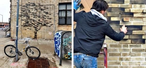 Художник създава илюзията, че тухлите на къщата се разпадат под формата на дърво.